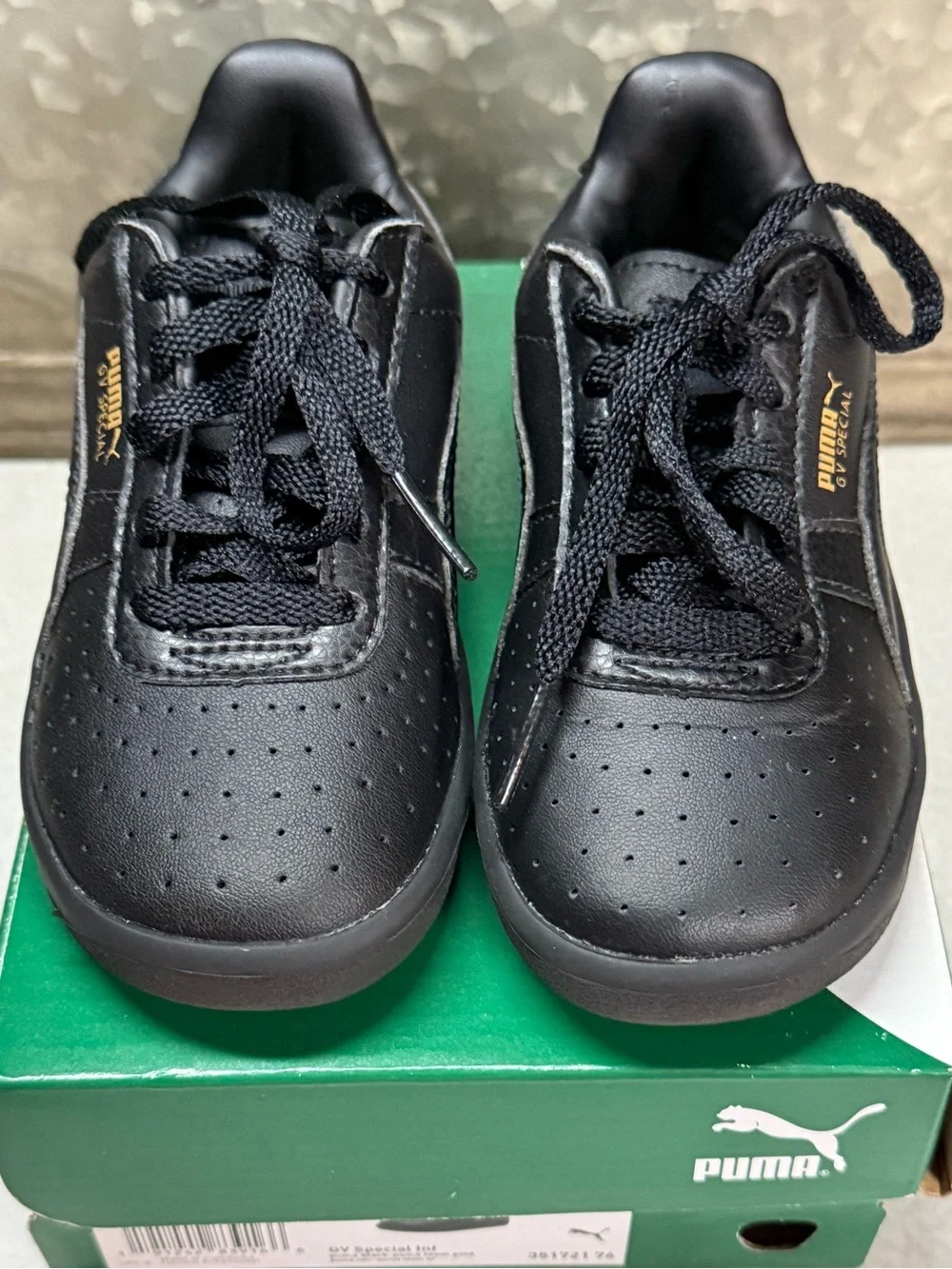 Puma Kids Black Low-Top Lace Sneakers with Gold Logo